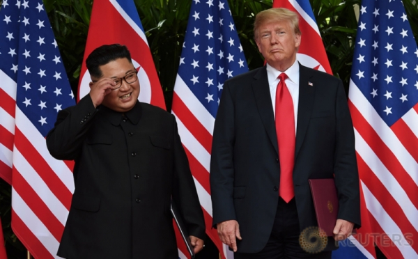 Ini Dia Momen Kebersamaan Donald Trump dan Kim Jong Un